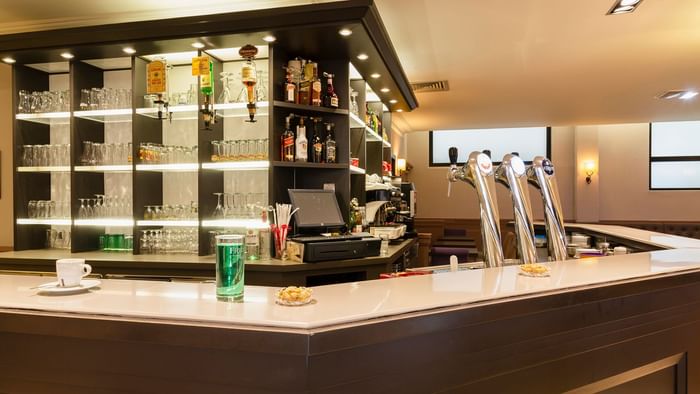 A drink served on a table at Hotel Le Grillon d'Or