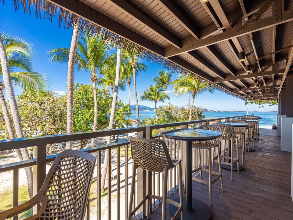 Stools & high tables on the terrace in Palomino Bar & Restaurant at Las Casitas Village