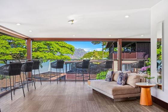 Open lobby lounge area overlooking the mountain ranges at Paradise Bay Resort