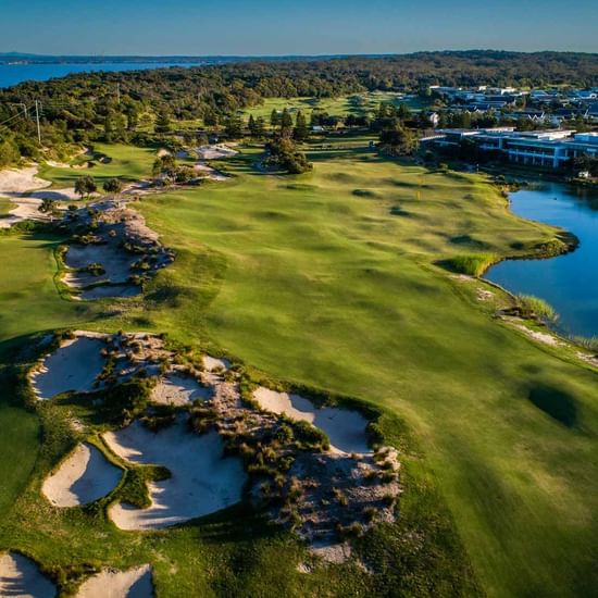 Aerial view of golf course near Pullman Magenta Shores Resort