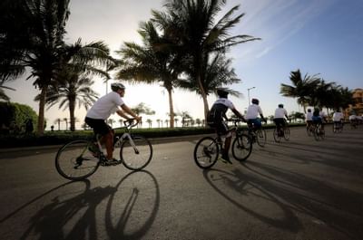 People riding bicycles near Bay La Sun Hotel & Marina