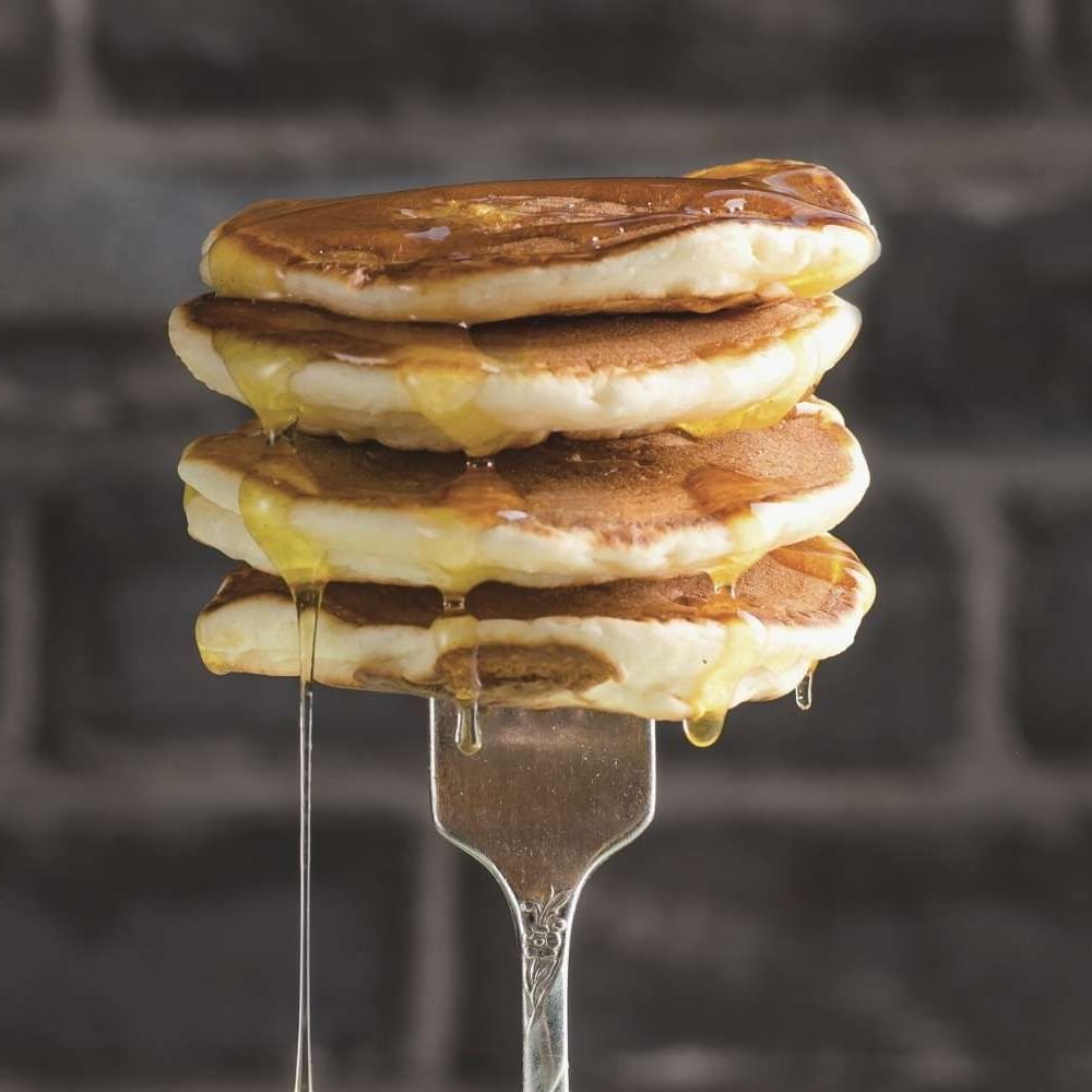 Close-up of a stack of pancakes served at Waikiki Resort Hotel by Sono