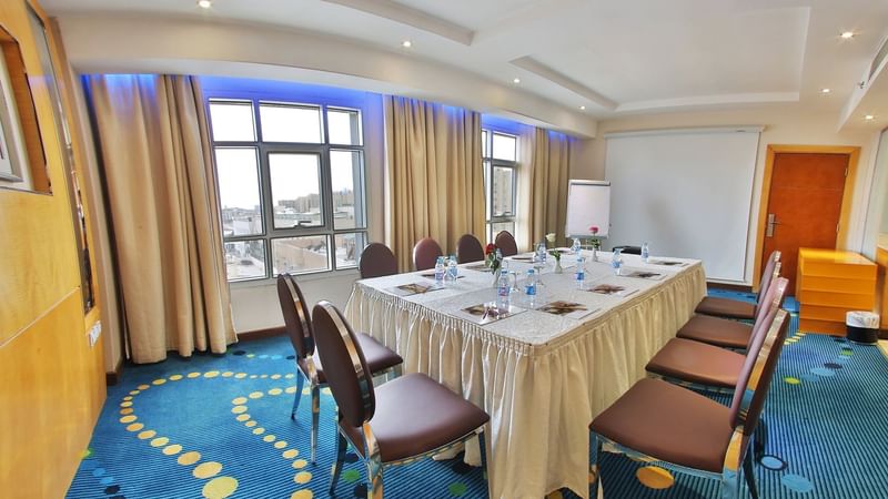 Boardroom table arrangement in the Business Centre at Dabab Hotel by Warwick - Riyadh