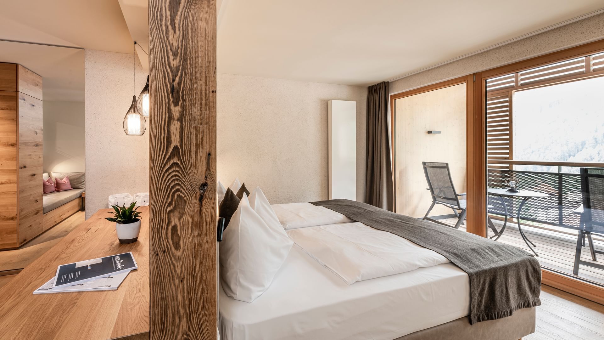Large bed in Double Room Jochtal at Falkensteiner Hotels