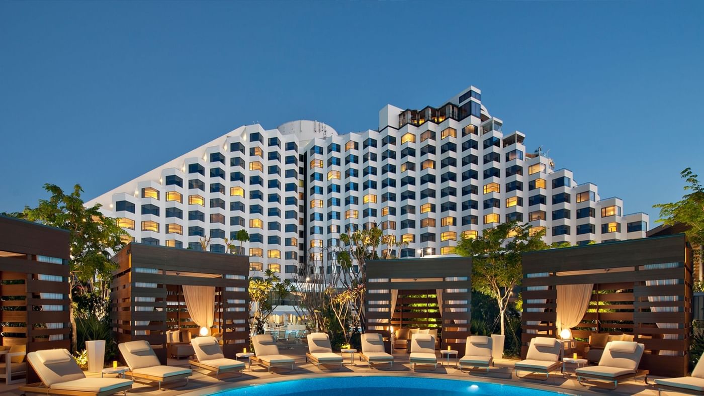 Exterior view of Crown Metropol Perth with pool beds and cabanas