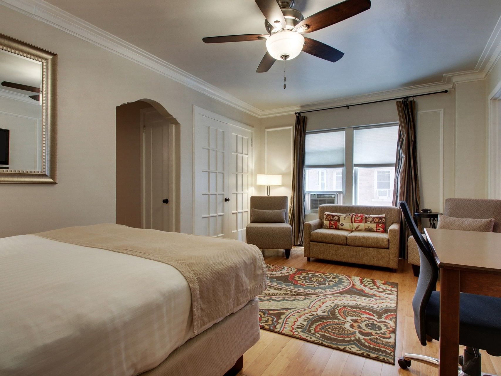 Workspace & seating area by the bed in Junior Suite at Knickerbocker On The Lake, perfect for extended stay, Milwaukee