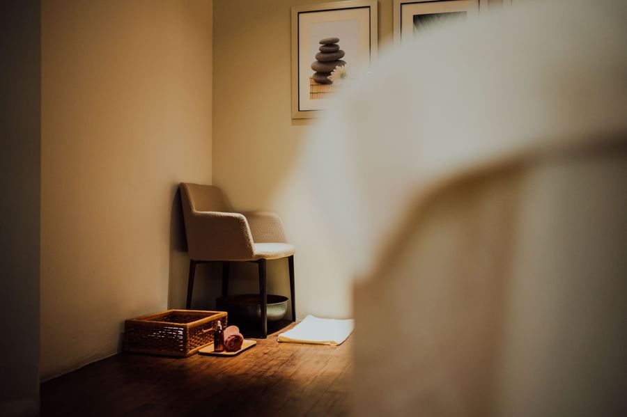 Foot massage area with amenities in The Fullerton Spa at The Fullerton Hotel Singapore