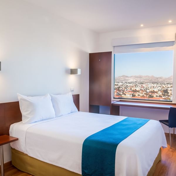 Interior of Superior One Queen Room at One Hotels