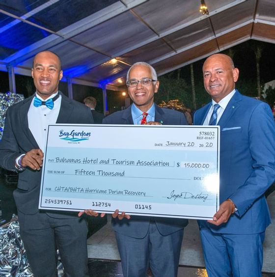 men holding checks