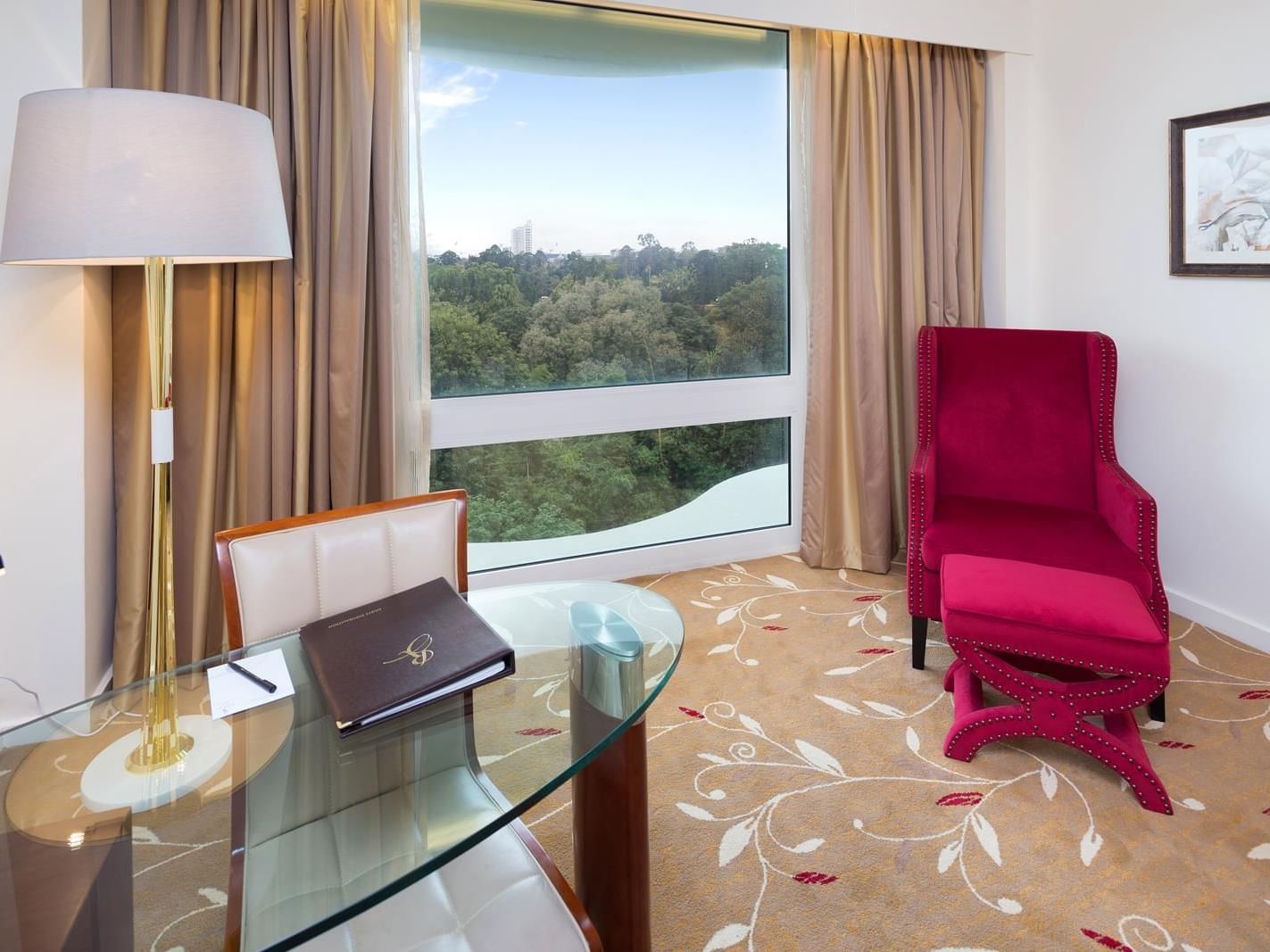 Premium City View King Room with Red chair and studying table rooms at Royal on the Park hotel