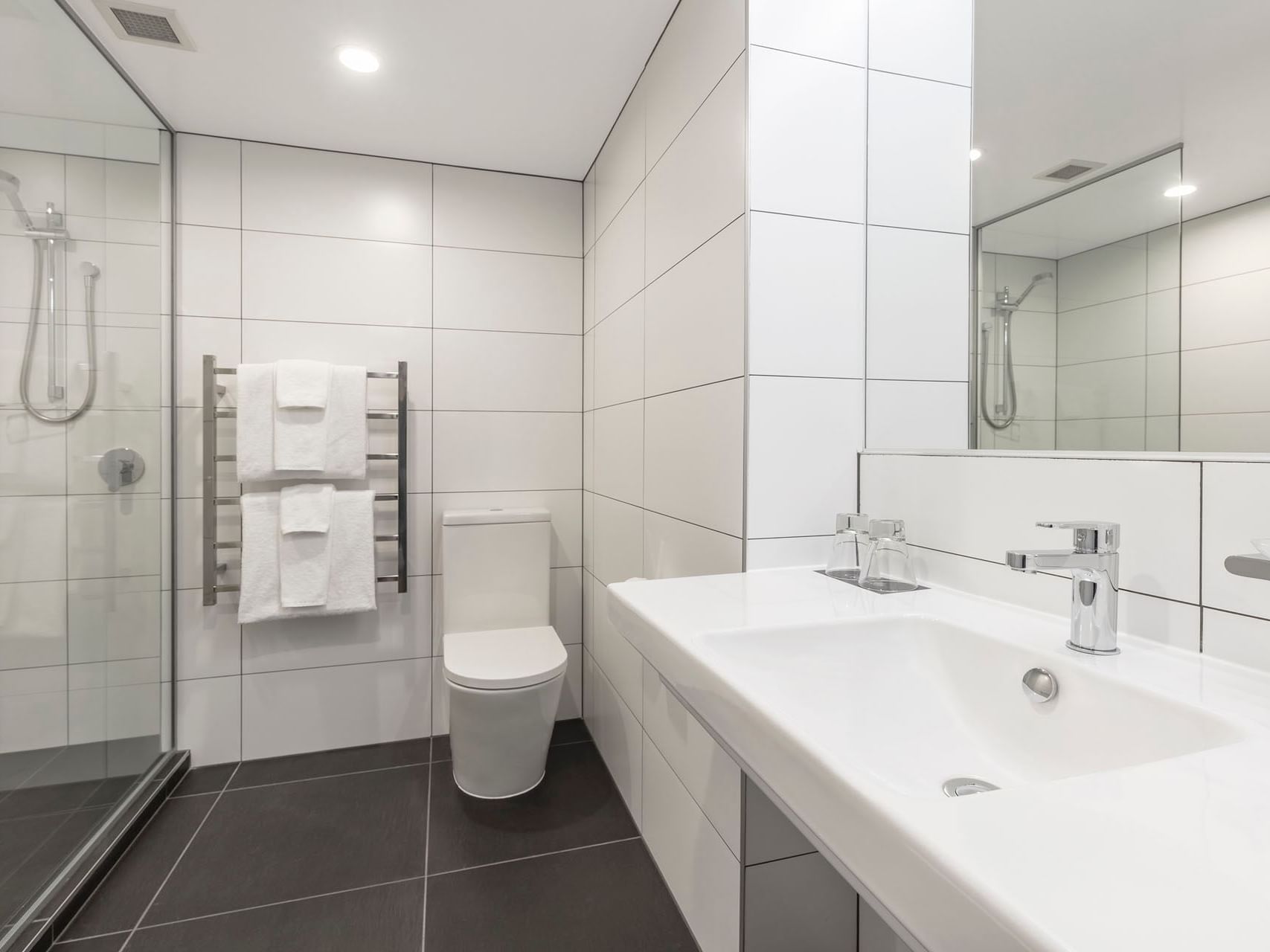Bathroom lavatory by the vanity in Executive King at James Cook Grand Chancellor
