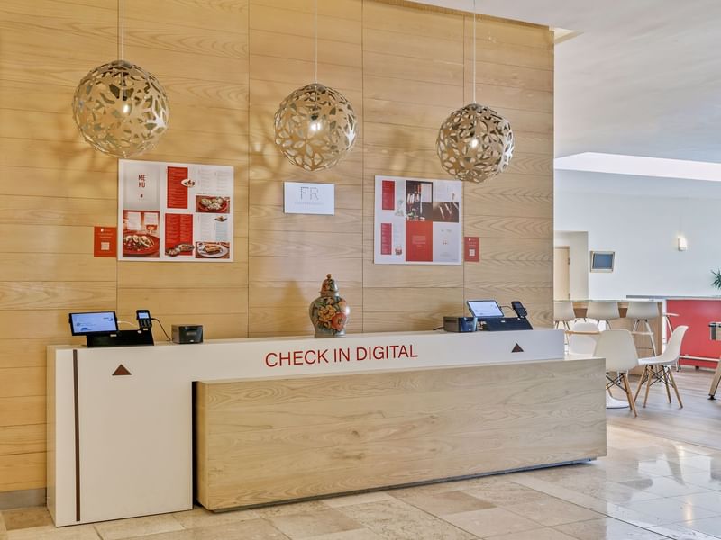 Front view of the Reception Counter at Fiesta Inn Hotels