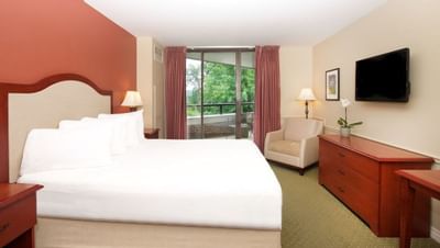 Bed & furniture in a bedroom at Washington Conference Center