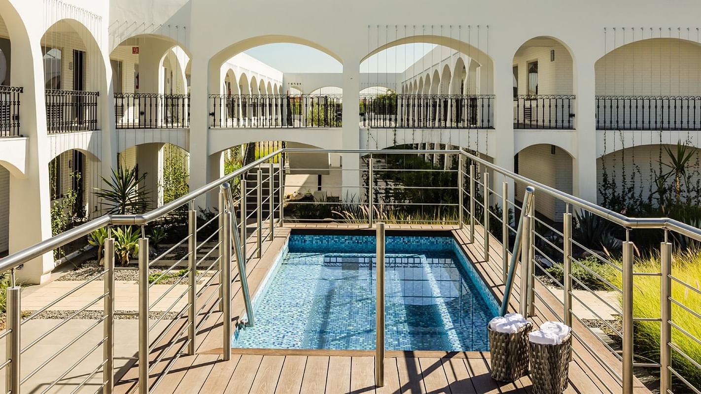 Relaxing outdoor pool area at Gamma Ciudad Juarez