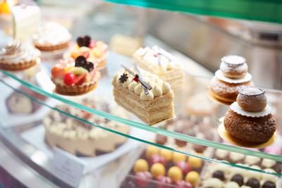 Close-up of elegant pies & cake slices at Hanoi Daewoo Hotel