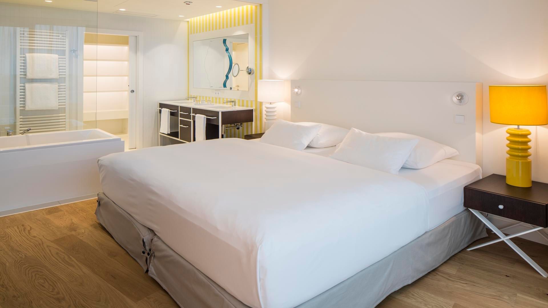 Bed in Seaside Penthouse sea view at Falkensteiner Hotels