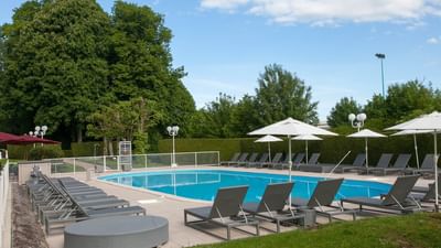 Pool at Hôtel-Club Cosmos in Contrexéville, France