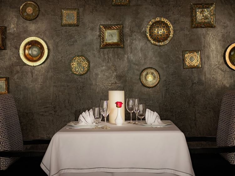 Elegant interior with decorative walls in Canto Del Mar restaurant at Marquis Los Cabos Resort