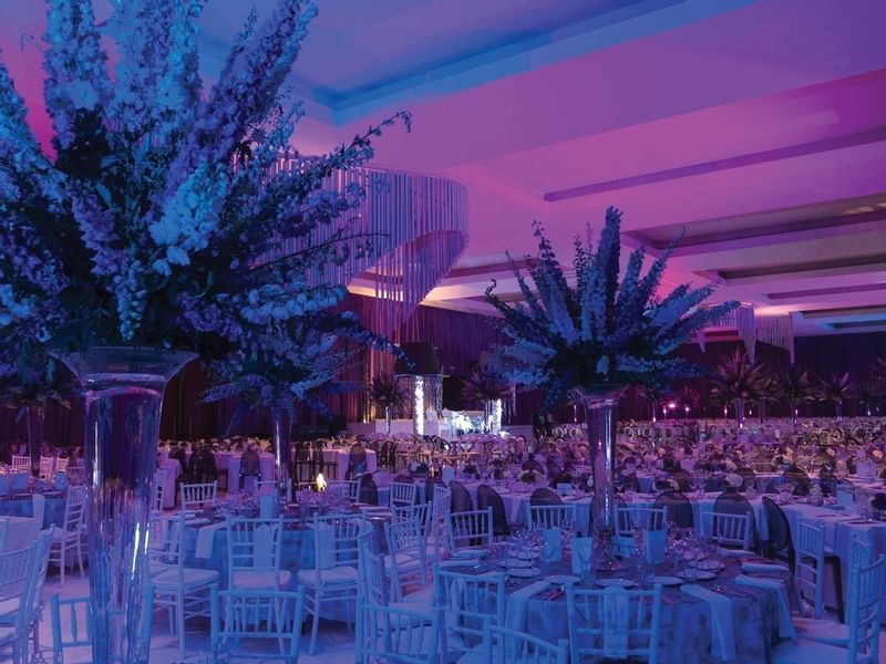 Floral banquet table décor in a Hall at La Colección Resorts