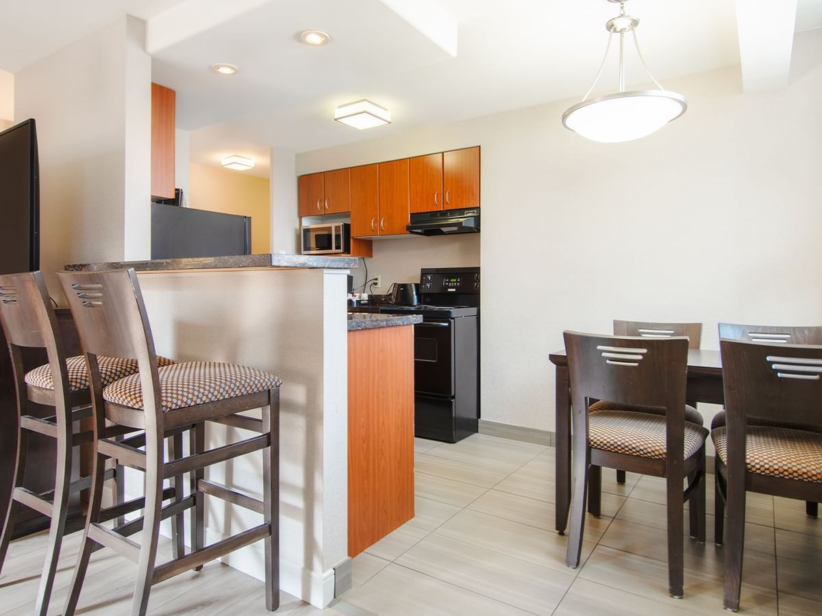Hotel suite kitchen with dining area