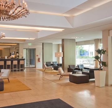 Modern interior with elegant decor and bar counter in Lobby Bar at Sylter Hof Berlin