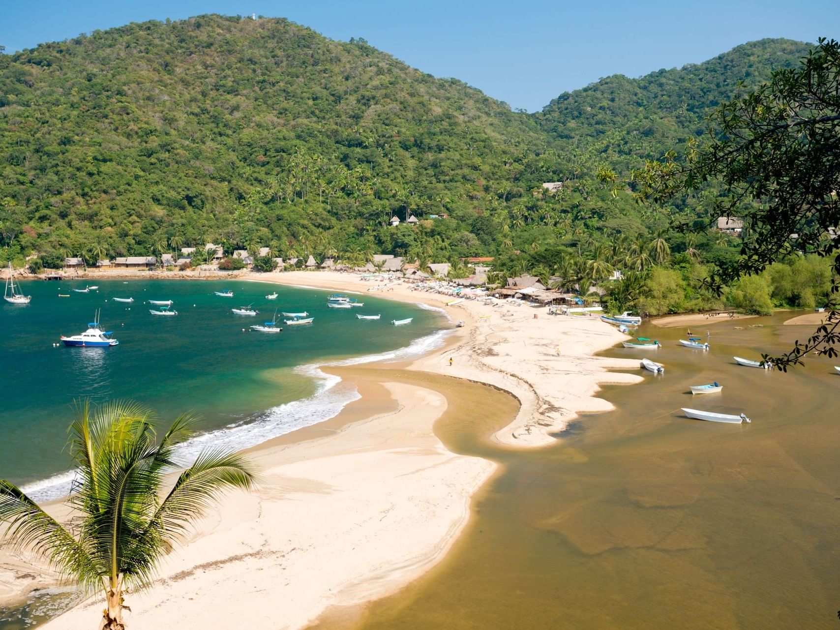 Boats on Yelapa Beach near Plaza Pelicanos Grand Beach Resort