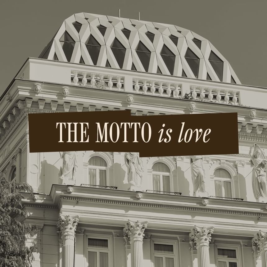 The Motto is Love poster featuring the exterior of Hotel Motto Vienna