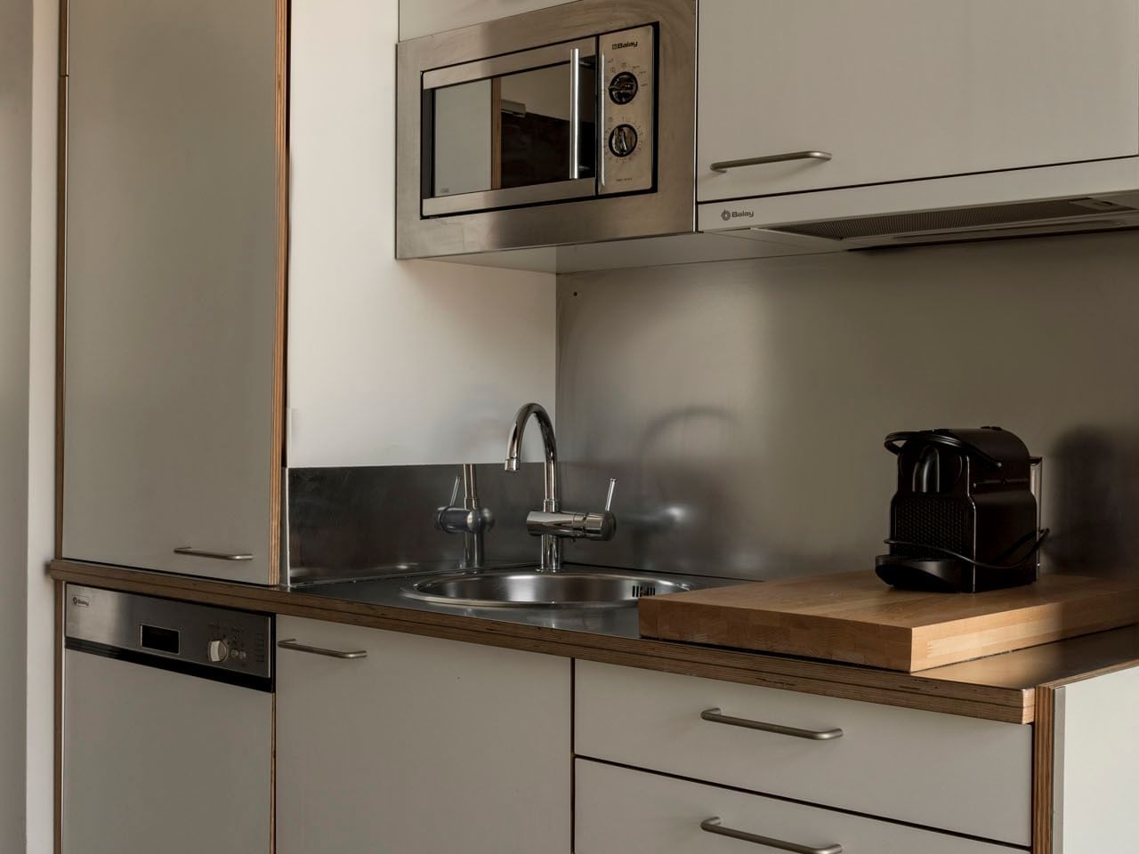 Kitchenette area in Standard room at Aparthotel Allada