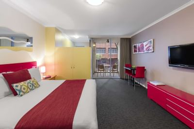 Interior of Pink themed Studio Apartment at Nesuto Hotels