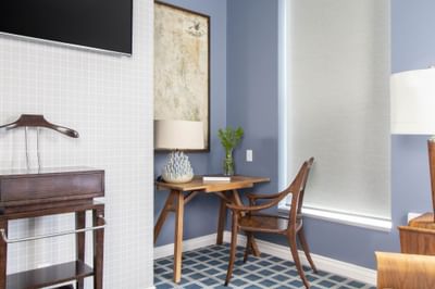 Work desk, chair & lamp in King Superior Study at Retro Suites Hotel