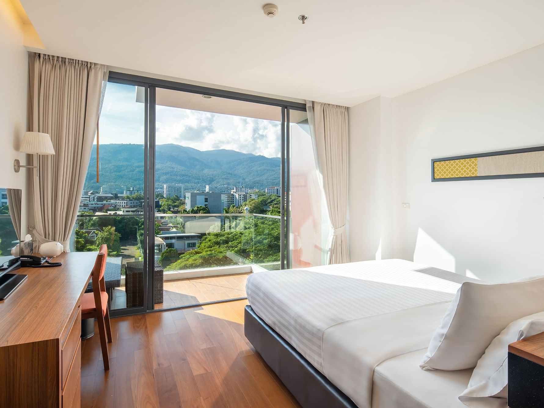 Bed in Superior Premium Mountain View at Eastin Hotels