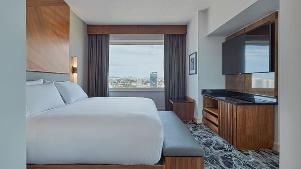 Luxury bed in Deluxe king room at Grand Fiesta Americana