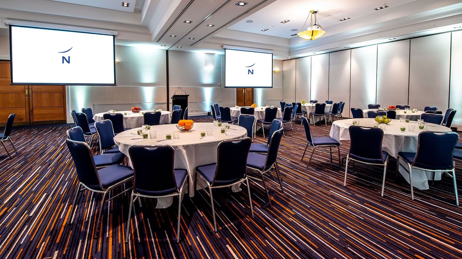 Banquet tables set-up in the Ballroom at Novotel Glen Waverley