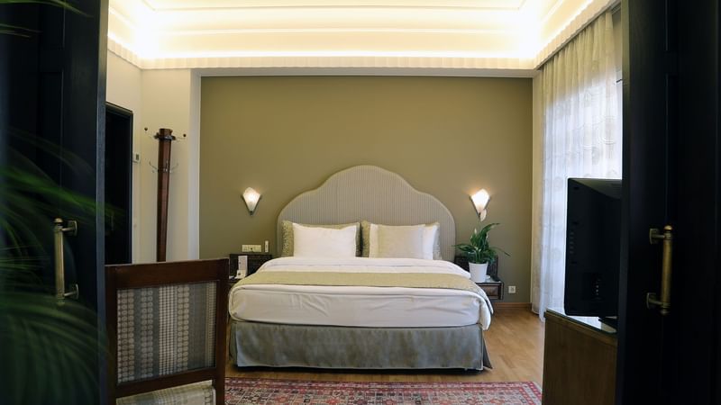 Spacious interior in Presidential Suite Bed by a window at Warwick Palm Beach Hotel - Beirut