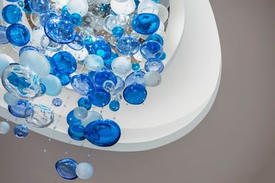 Blue and white chandelier with bubbles at Temple Gardens Hotel & Spa