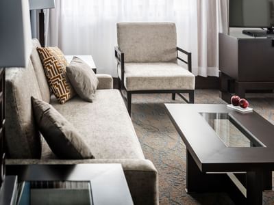 living room with sofa, accent table and coffee table