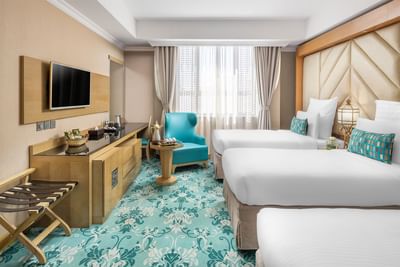 Bedroom area in Standard Triple Room at Elaf Al Taqwa