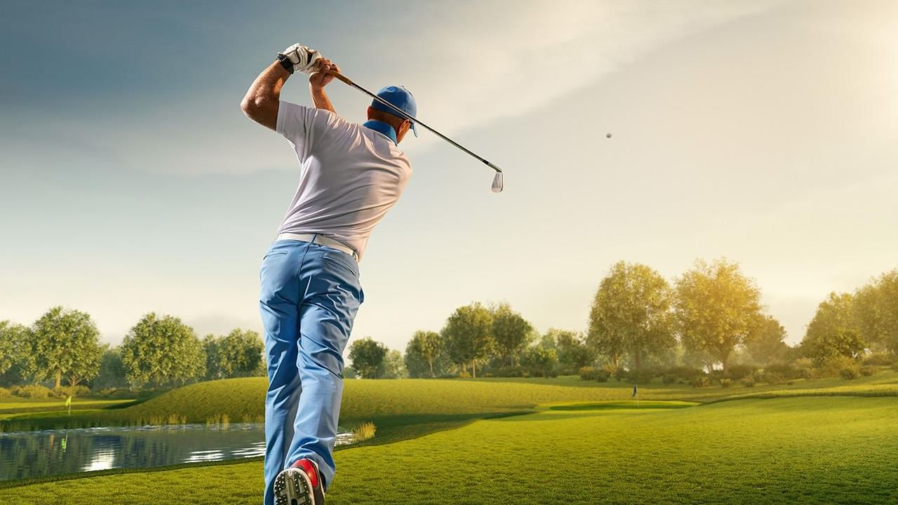 A man playing golf at Live Aqua Private Residences Los Cabos