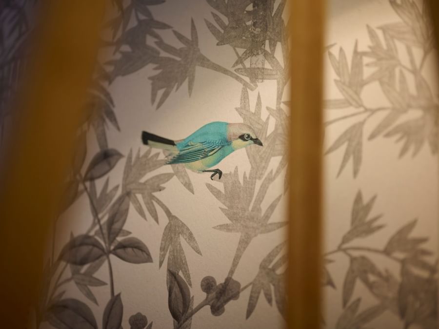 A wall art with a bird at The Originals Hotels