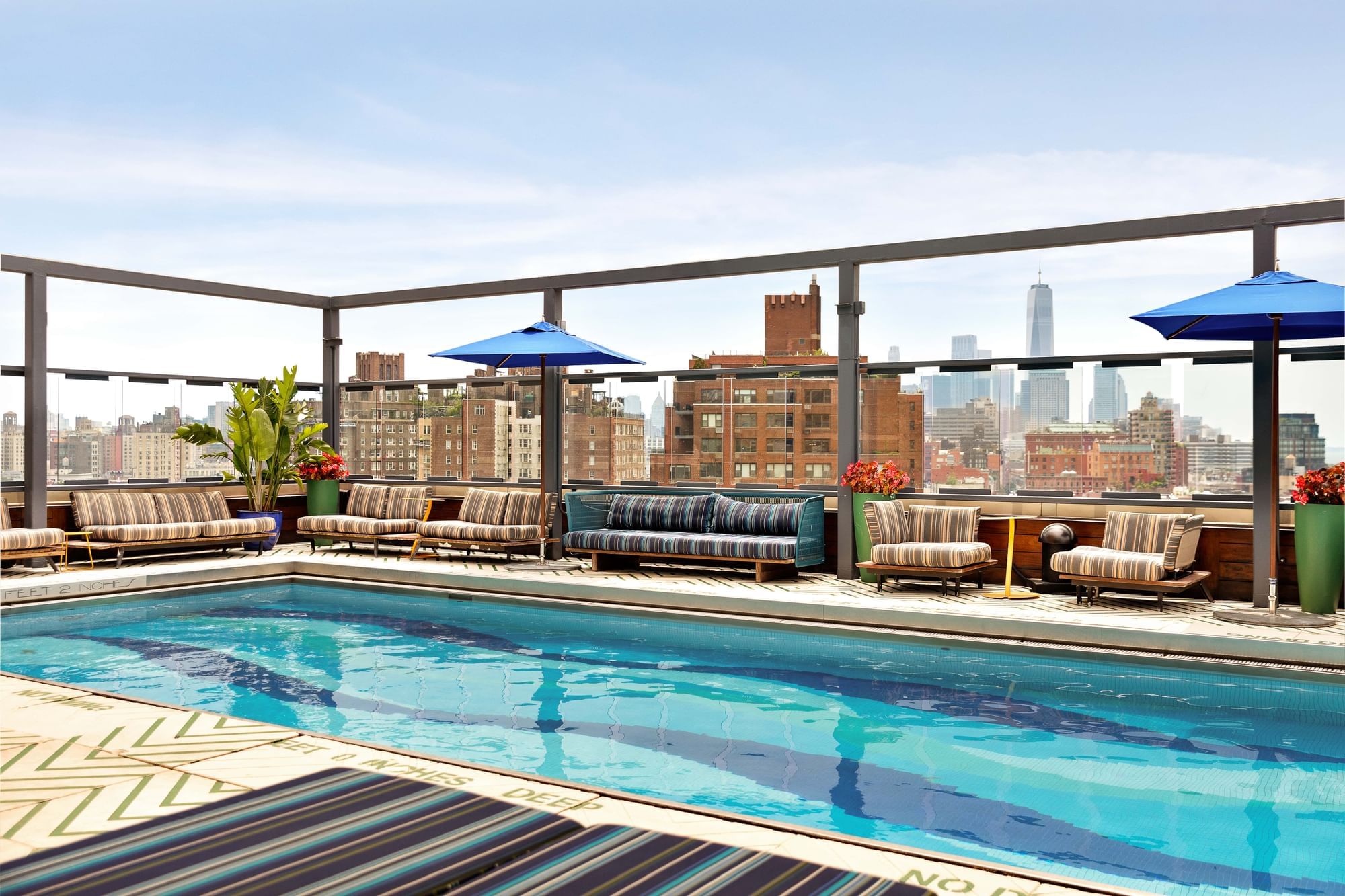 Pool with city skyline in the background 