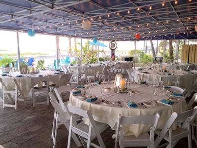 tables and chairs at in an outdoor wedding venue