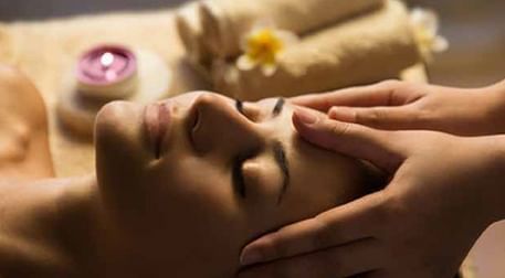 Lady receiving a spa treatment in Jardin Spa at DAMAC Maison Cour Jardin