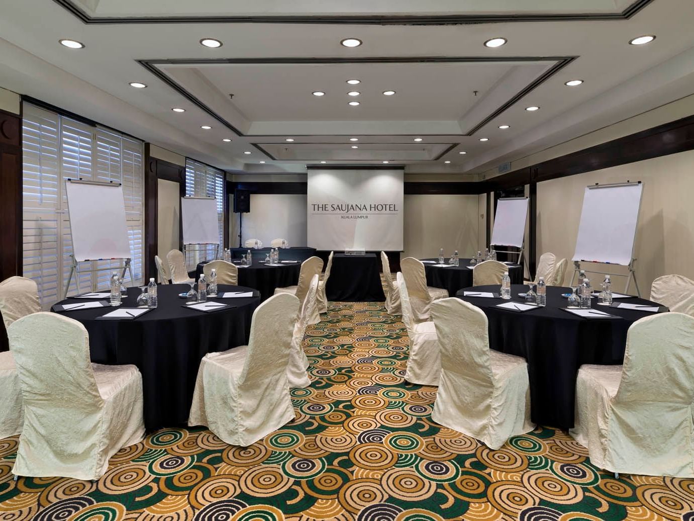 Interior of Delima meeting room with a banquet table arrangement at Saujana Hotel Kuala Lumpur