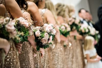 A group of bridesmaids holding flowers