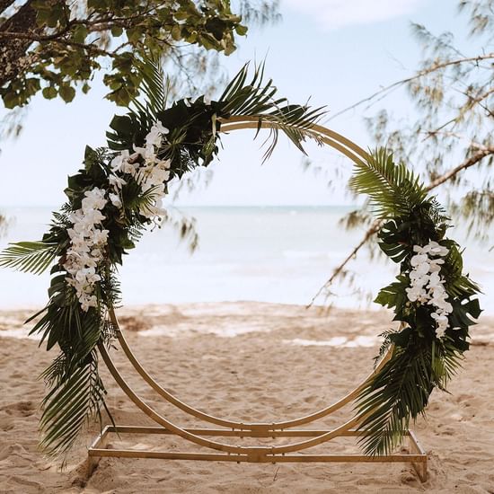 Arbour set on the beach near Pullman Palm Cove Sea Resort