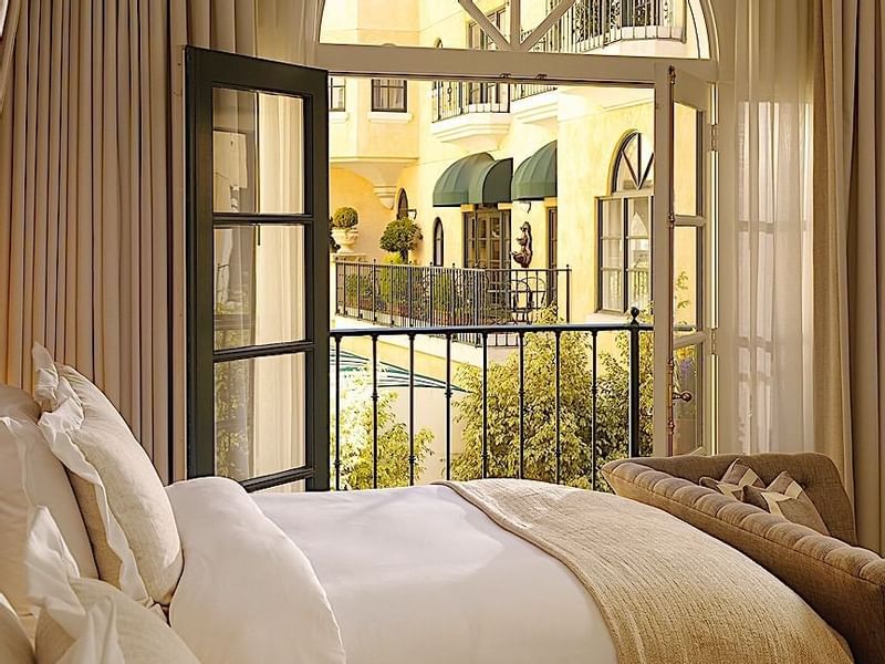View from a guest room balcony at El Prado Hotel, overlooking the charming courtyard