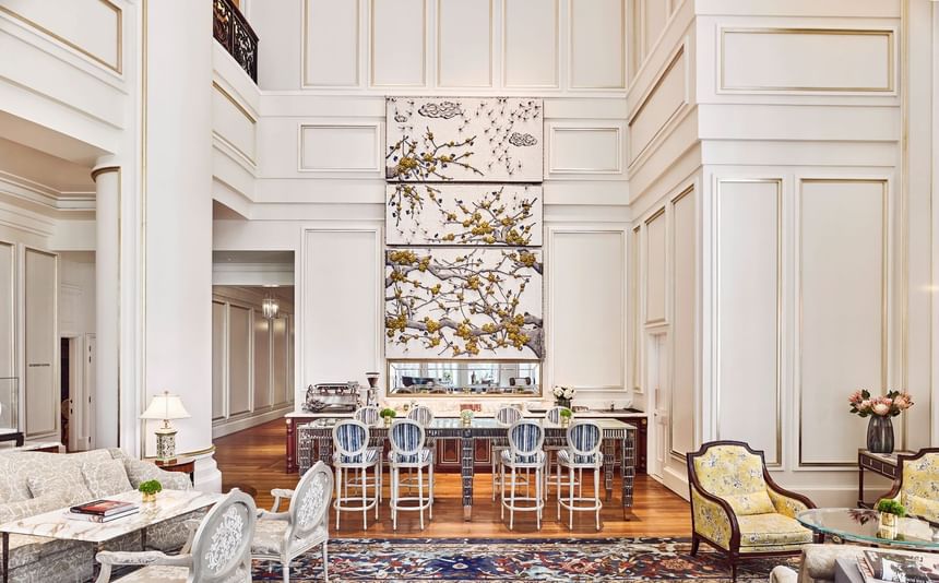 Park Lounge interior featuring high ceilings, modern bar seating, and floral artwork on the wall at Park Hyatt Saigon