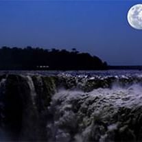 View of a Full moon by The Iguazú falls near DOT Hotels
