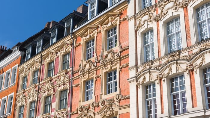 Exterior view of a building in Saint-Omer near Originals Hotels