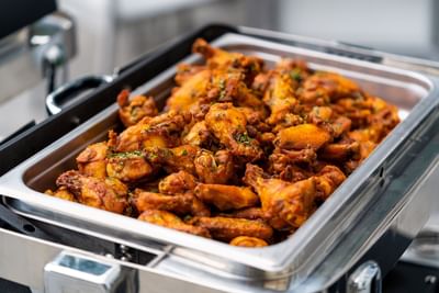 Buffalo wings served in restaurant at Innovation Hotel